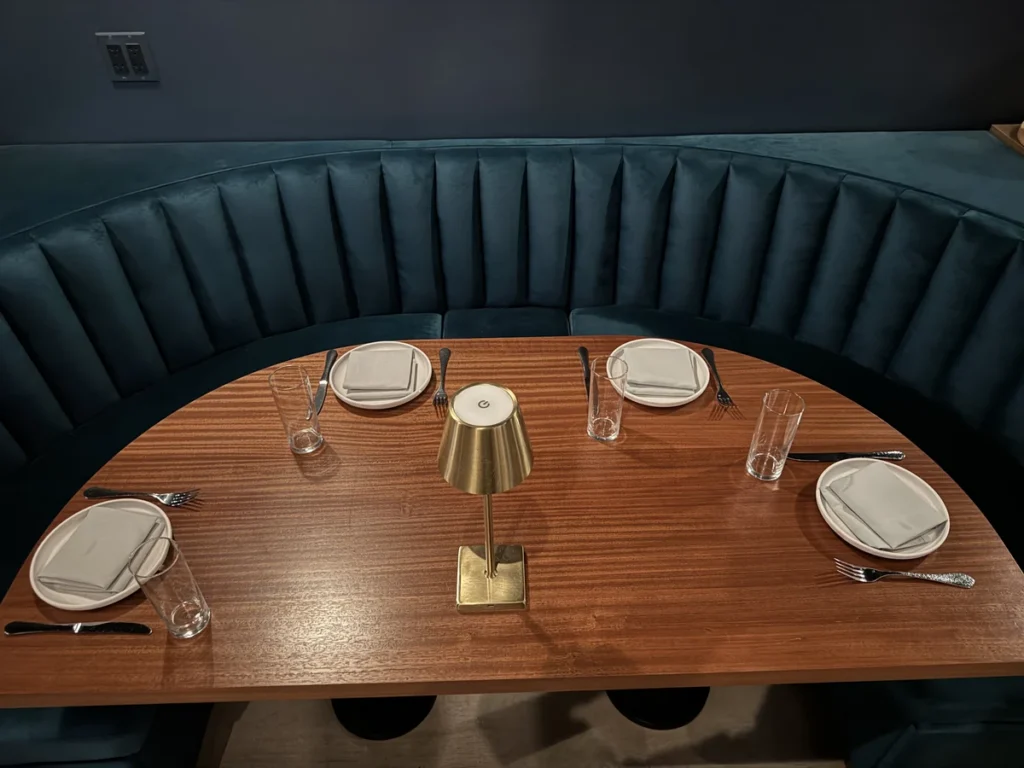 Intimate oceanfront seating arrangement overlooking the Santa Barbara coastline at sunset